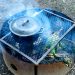 Lodge Dutch oven on a camp fire